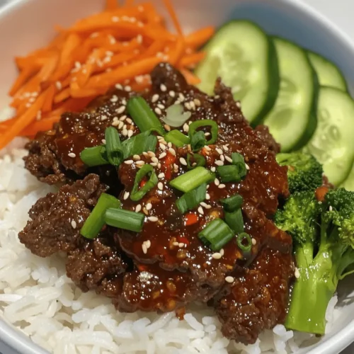 Korean Ground Beef Bowls are not just a meal; they are an experience. With the rich umami flavor of soy sauce, the spicy kick from gochujang, and the nutty aroma of sesame oil, each bite transports you to the bustling streets of Seoul. The beauty of this dish lies in its adaptability; it can be whipped up in under 30 minutes, making it a fantastic choice for busy weeknights or meal prep. Furthermore, the combination of ground beef, fresh vegetables, and rice ensures a well-rounded meal that is both filling and nutritious.