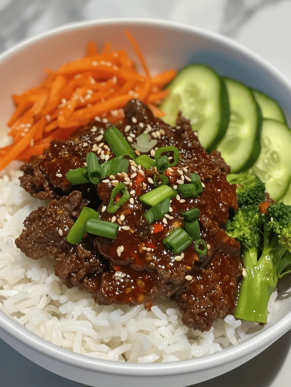 Korean Ground Beef Bowls are not just a meal; they are an experience. With the rich umami flavor of soy sauce, the spicy kick from gochujang, and the nutty aroma of sesame oil, each bite transports you to the bustling streets of Seoul. The beauty of this dish lies in its adaptability; it can be whipped up in under 30 minutes, making it a fantastic choice for busy weeknights or meal prep. Furthermore, the combination of ground beef, fresh vegetables, and rice ensures a well-rounded meal that is both filling and nutritious.
