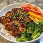 The Teriyaki Chicken Rice Bowl is a beloved dish that has made its way into the hearts and homes of many across the globe. With its vibrant flavors and enticing aroma, this dish brings a delightful taste of Japanese cuisine right to your kitchen. The combination of tender chicken coated in a luscious, sweet-savory glaze served over a bed of fluffy rice creates a satisfying meal that is perfect for a busy weeknight dinner or a festive family gathering.