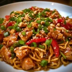 Kung Pao Chicken, known as "Gong Bao Ji Ding" in Mandarin, traces its roots back to the late Qing Dynasty in China. The dish is named after Ding Baozhen, a governor of Sichuan province, who was known as "Kung Pao" (or "palace guardian"). Originally, the dish was prepared with diced chicken, peanuts, and chili peppers, stir-fried in a hot wok. The unique combination of flavors and textures quickly turned it into a beloved staple in Chinese cuisine.